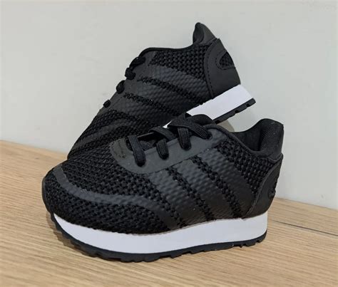 adidas black trainers size 4.